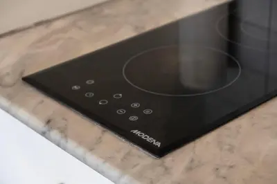 a microwave oven sitting on a counter at Villa Joli in Seminyak