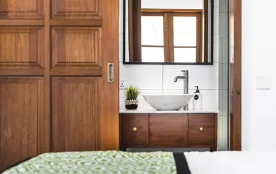 a bathroom with a sink and a mirror at Villa Alfie in Seminyak