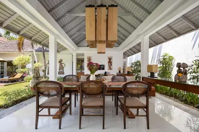 a dining room with a table and chairs at 2BR Private Villa Seminyak, Villa Kiran One in Seminyak