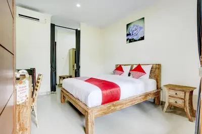 a bedroom with a bed in a room at Hotel O March 67 Stay in Balian