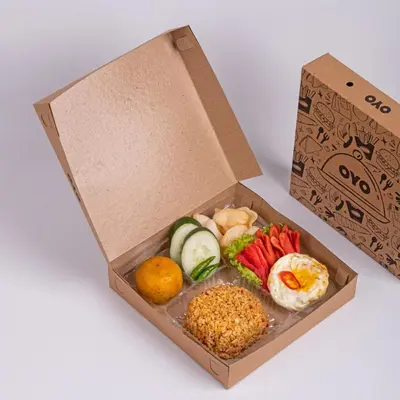 a box filled with different types of food at Hotel O March 67 Stay in Balian