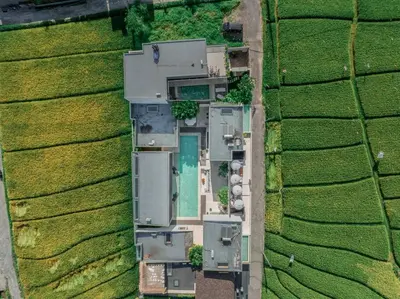 an overhead view of a house in a field at Villa Boya - 6BR luxury oasis in Central Berawa in Canggu