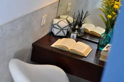 a desk with two open books on it at 2BR Villa Violetta - Minggu Villas - Special Stay Bonus in Kerobokan