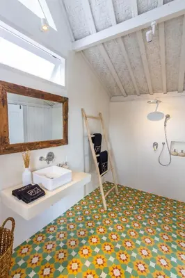 a bathroom with a sink and a mirror and a sink at Villa M2 Seminyak by Alfred in Bali in Seminyak