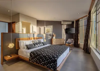 a bedroom with a large bed in a room at La Maison d'Ulysse - Luxury 4-Bedroom Villa with Pool in Canggu in Kerobokan
