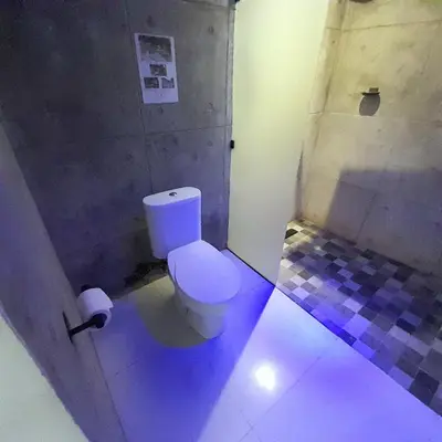 a bathroom with a white toilet in a room at PROMO Private Vacation Rental Villa 2 Pools 4 Bedrooms 4 Bathrooms Free Scooter up to 3 scooters in Seminyak