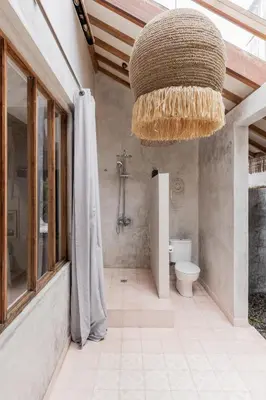 a bathroom with a shower and a toilet at Villa Palm Jari 1 by Alfred in Bali in Canggu