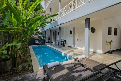 an image of a swimming pool in a villa at The Kanjeng Suites Petitenget in Seminyak