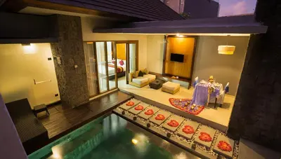 an aerial view of a house with a swimming pool at Samaja Villas Seminyak in Seminyak