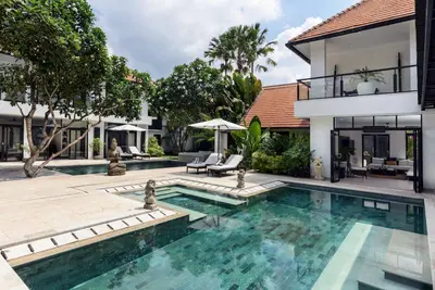 a swimming pool in the backyard of a house at Villa Anaya Manis in Seminyak