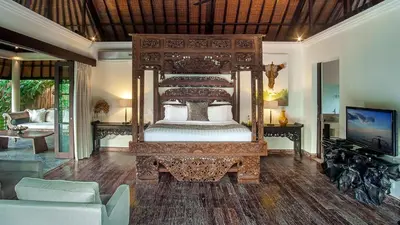 a bedroom with a large bed in a room at Villa Avalon by Elite Havens in Canggu