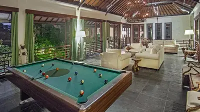 a billiard room with a pool table in a house at Villa Avalon by Elite Havens in Canggu