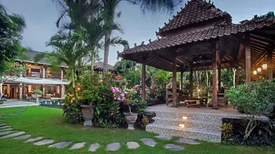 a house with a garden with a gazebo at Villa Avalon by Elite Havens in Canggu
