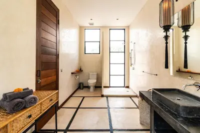 a bathroom with a sink and a toilet at PROMO Large Astonishing 5 BR Luxury Private Villa in Canggu