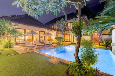 an image of a villa with a swimming pool at Villa Dorado - Steps from Jimbaran Beach in Jimbaran