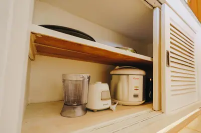 a kitchen pantry with a blender and other appliances at Villa Orked 3 with family room Seminyak in Seminyak