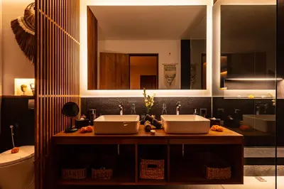 a bathroom with two sinks and a toilet at PROMO Luxury 4bd Villa in HotSpot with Huge Private Pool in Seminyak