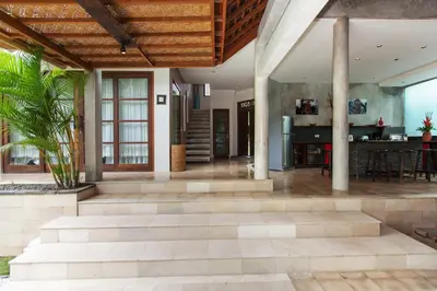 an open floor plan with a kitchen and a living room at Villa Liang by Nagisa Bali in Seminyak