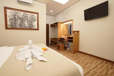 a hotel room with a star on the bed at Sunkiest House Canggu in Canggu