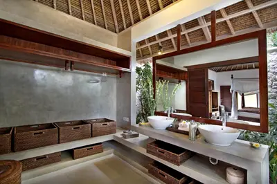 a bathroom with two sinks and a large mirror at Istana Semer - Balinese Style Private Event Villa, with Large Pool, Gardens and Cook - Near to Canggu & Seminyak in Kerobokan