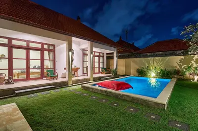 a house with a swimming pool in the yard at CASA BEGJA I Tranquil 2BR Villa w Private Pool in Mertanadi in Seminyak