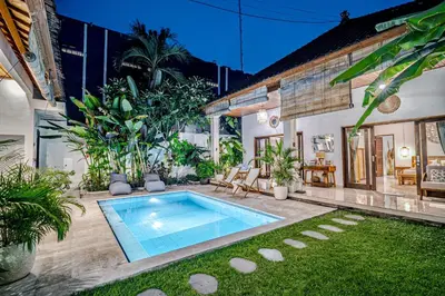 a swimming pool in the backyard of a house at Villa Deba 3 by Bali Villa Solutions in Seminyak