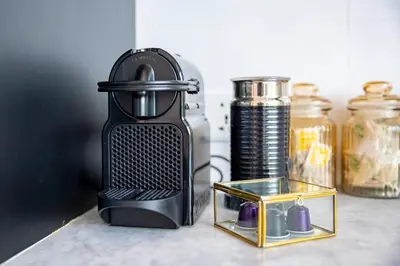 a black blender sitting on top of a counter at Villa Caorrun Canggu in Canggu