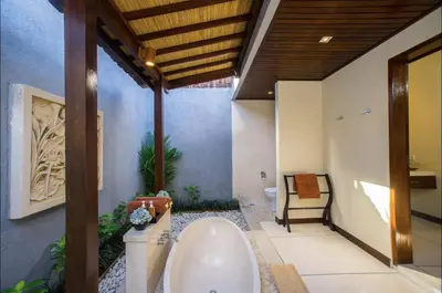 a bathroom with a sink and a bath tub at Villa MD 3 bedroom, Sunny Pool in Eat st location in Seminyak