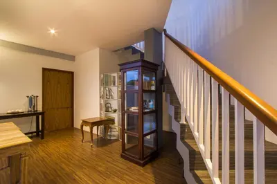 a staircase in a house with a stair case at M Suite Bali in Seminyak