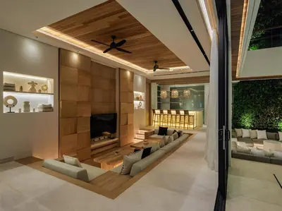 a living room with a couch and a fireplace at Villa Nini Elly by Elite Havens in Canggu