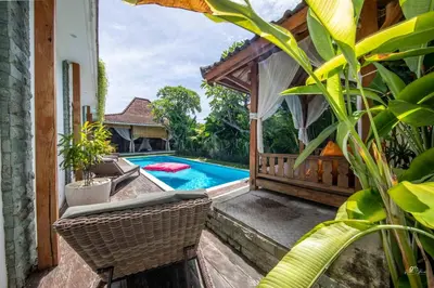 a view of the pool from the balcony of a villa at Elvano villa in heart of seminyak and near beach in Seminyak