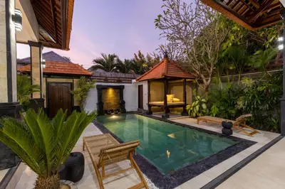 a swimming pool in the backyard of a villa at Villa Casa Orana in Seminyak