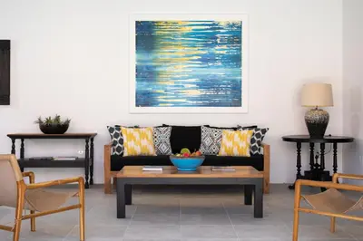 a living room with a couch and a table at Villa Toru - Stylish luxury in Legian, tranquil location, walk to beach in Legian