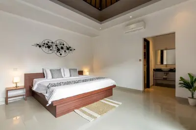 a bedroom with a large bed in a room at Villa Estella ☆ Seminyak Kuta - Private Pool in Seminyak