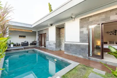 a swimming pool in the backyard of a house at Villa Estella ☆ Seminyak Kuta - Private Pool in Seminyak