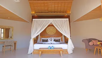 a bedroom with a bed with a canopy at Vivara Bali Private Pool Villas & Spa Retreat in Jimbaran