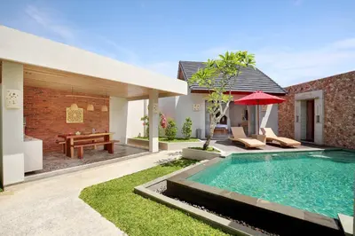 a swimming pool in the backyard of a villa at Vivara Bali Private Pool Villas & Spa Retreat in Jimbaran
