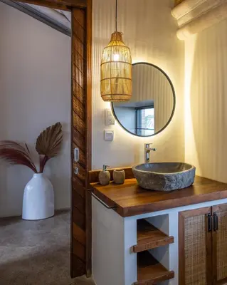 a bathroom with a sink and a mirror at Villa Annabelle Canggu in Kerobokan