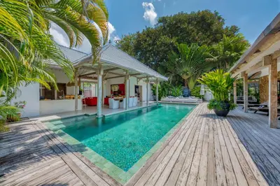a swimming pool in the backyard of a villa at PROMO 4 bd Spacious villa in strategic location in Seminyak