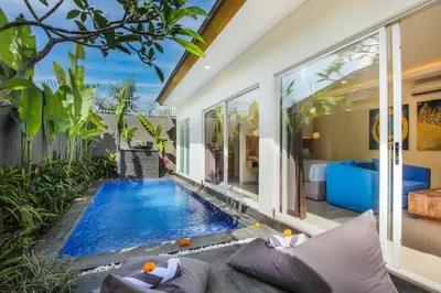 an indoor swimming pool in a villa at Le Cielo Romantic Villas by Maviba in Seminyak