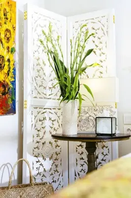 a table with a potted plant on top of it at Villa Kayan - Gorgeous 2BR Seminyak gem, fabulous location steps from restaurants, cafes and shopping in Seminyak