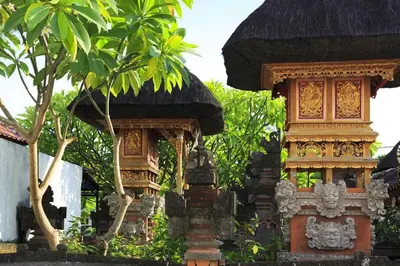 a small building with a black roof at Villa Kayan - Gorgeous 2BR Seminyak gem, fabulous location steps from restaurants, cafes and shopping in Seminyak