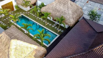 an overhead view of a swimming pool in a resort at Villa Cocotier by Alfred in Bali in Seminyak