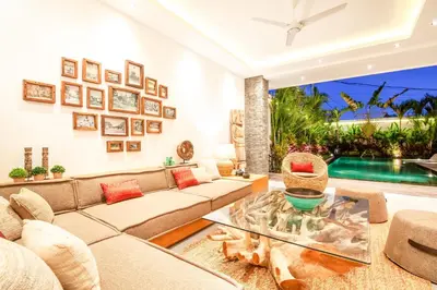 a living room with a couch and a table at Exquisite 4Bd Gem, 5min to Finns Coastal Vibe in Canggu