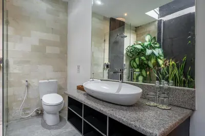 a bathroom with a sink and a toilet at Villa Alchemy Private 4 BR Eat Street 10 steps to Revolver Cafe in Seminyak