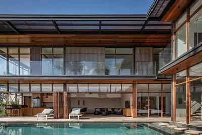 an external view of a house with a pool at Marvelous 6BR, Panoramic Views, Ultimate Luxury in Canggu