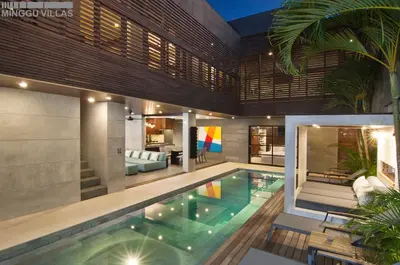 a swimming pool in the middle of a house at 8BR Villa Jumis - Minggu Villas Seminyak in Seminyak