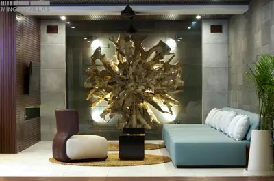 a living room with a couch and a chandelier at 8BR Villa Jumis - Minggu Villas Seminyak in Seminyak