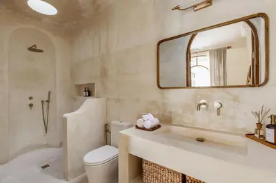 a bathroom with a sink and a toilet and a mirror at NEW Design villa, Casa Alma Bali, 2BR with private pool in Canggu