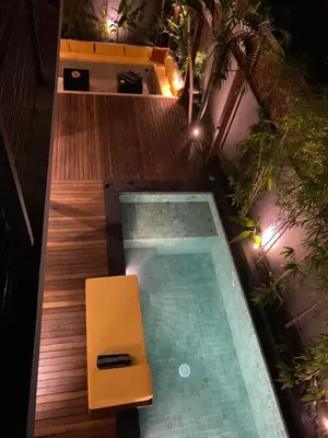 an overhead view of a swimming pool on a balcony at ZenBali 1 Villa Canggu in Canggu